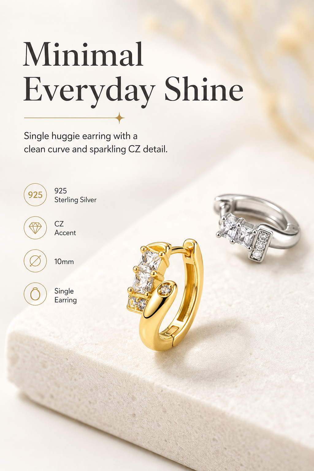 single huggie earring with CZ nail detail hero image