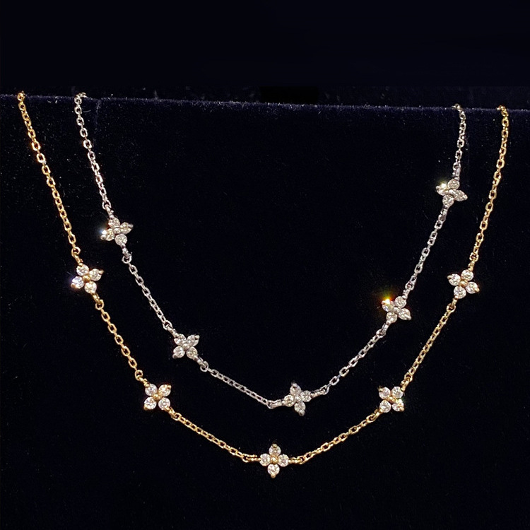 S925 silver four leaf clover CZ station bracelet clasp and chain detail