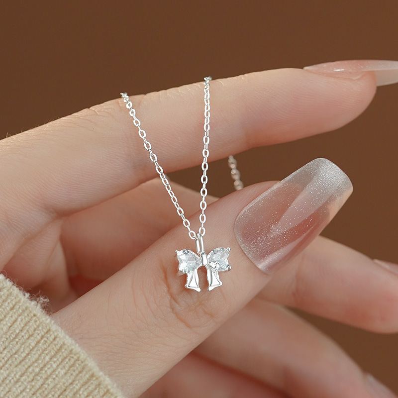 S999 Silver CZ Bow Pendant Necklace for Women main product image 1