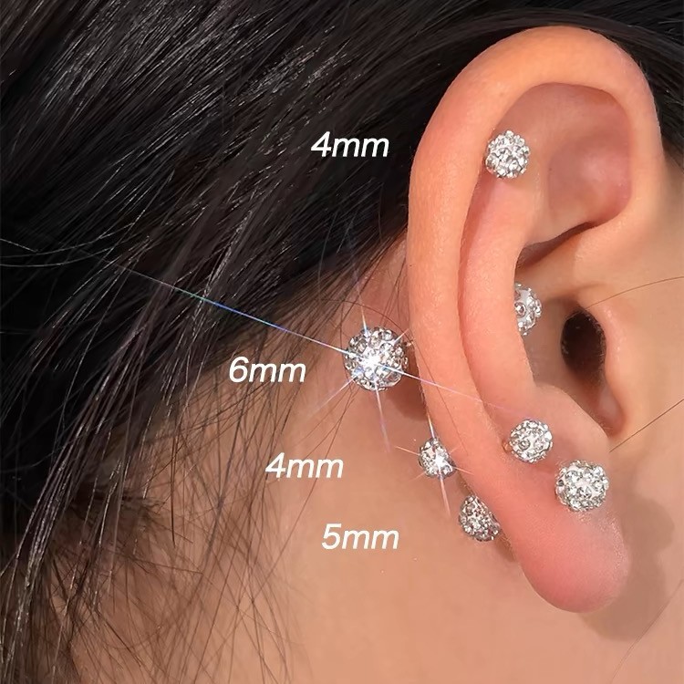 S999 silver CZ bead stud earrings worn in multiple sizes